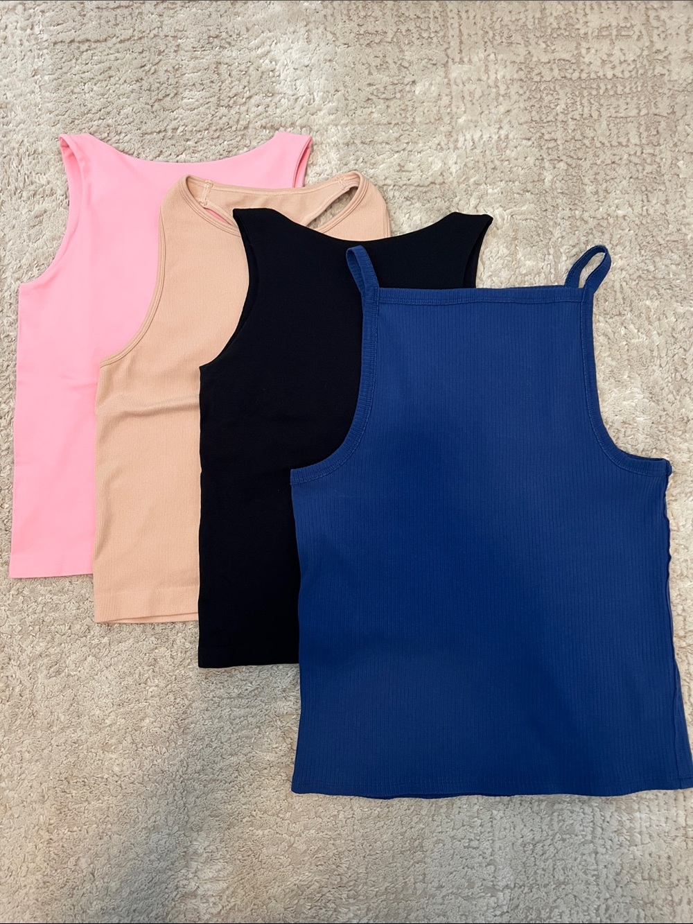 Free People Ribbed and Nylon Tank Tops in Blue, Black, Pink, and Nude